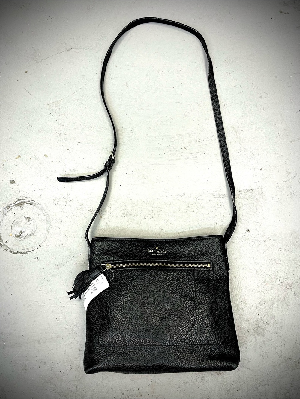 kate spade Black Pebbled Leather Crossbody with Tassel Zip